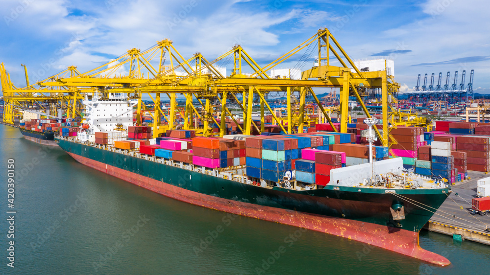Aerial view container ship, import export commerce global business trade logistic and transportation of International by container ship boat, Cargo freight shipping maritime sea port terminal.