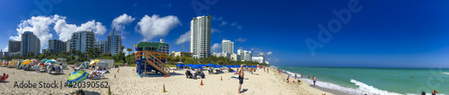 MIAMI BEACH, FL - FEBRUARY 2016: Tourists and locals enjoy the beautiful city beach