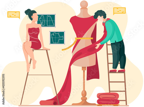 Tailor puts fabric on model. Girl is sitting on stool and looking at mannequin with dress