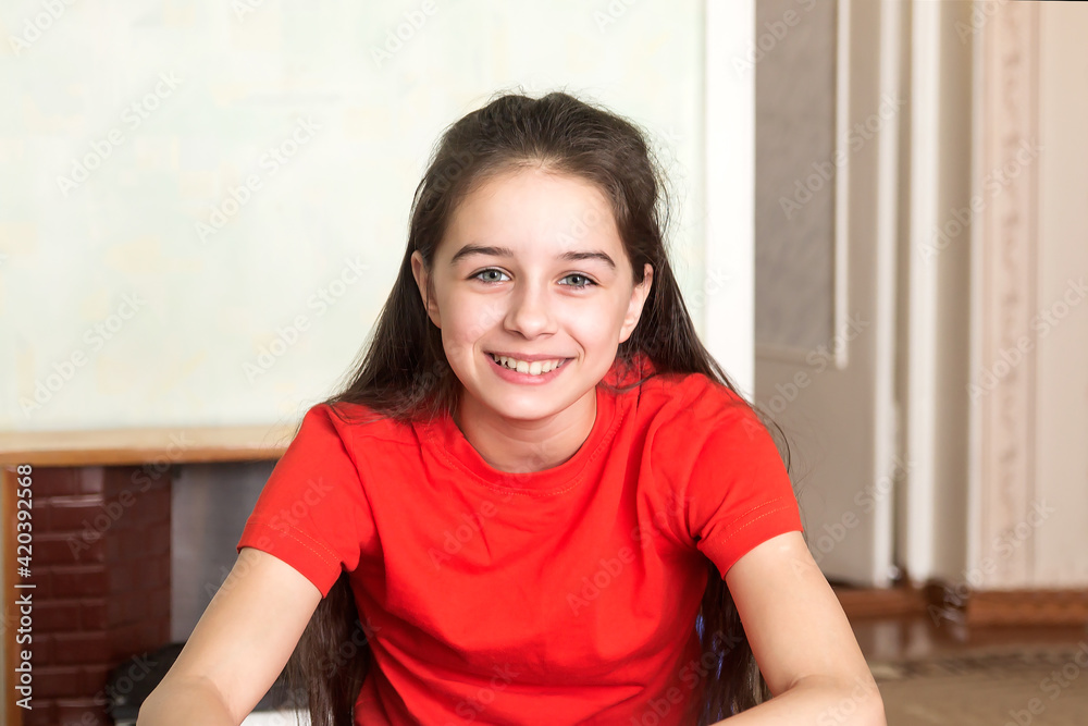 Portrait of a happy smiling little girl having a rest at home. Portrait of a happy smiling little girl having a rest at home.