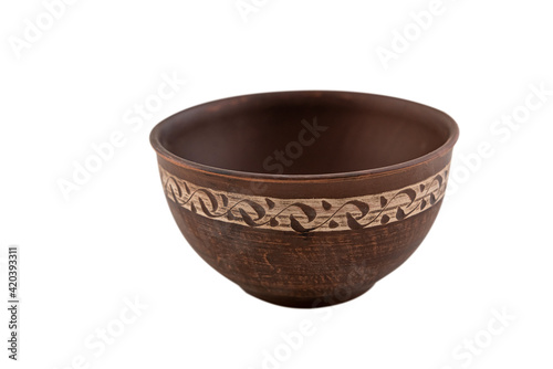 handmade traditional brown clay plate isolated