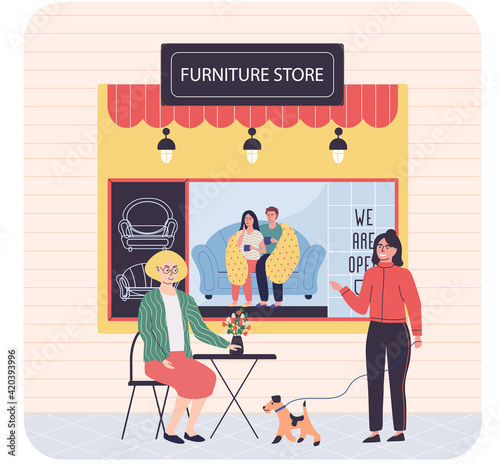 Furniture store, female buyer consults with seller regarding purchase of couch during sale
