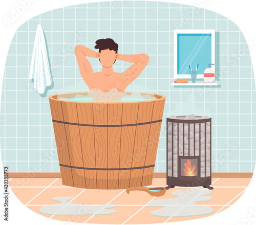 Bathhouse or banya at home interior design. Guy in barrel resting in sauna. Man in hot steam