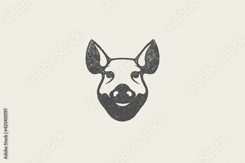 Pig head silhouette for meat industry hand drawn stamp effect vector illustration.