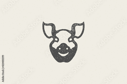 Pig head silhouette for meat industry hand drawn stamp effect vector illustration.