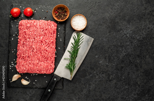 fresh minced meat on stone background with copy space for your text