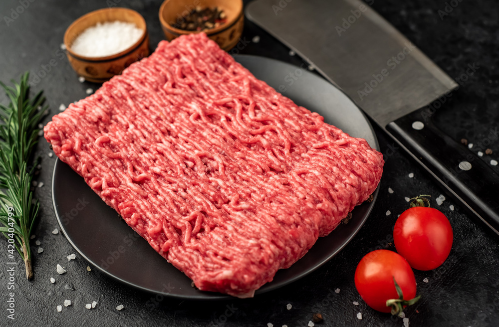fresh minced meat on stone background