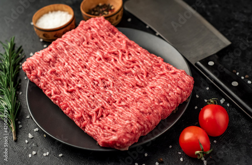 fresh minced meat on stone background