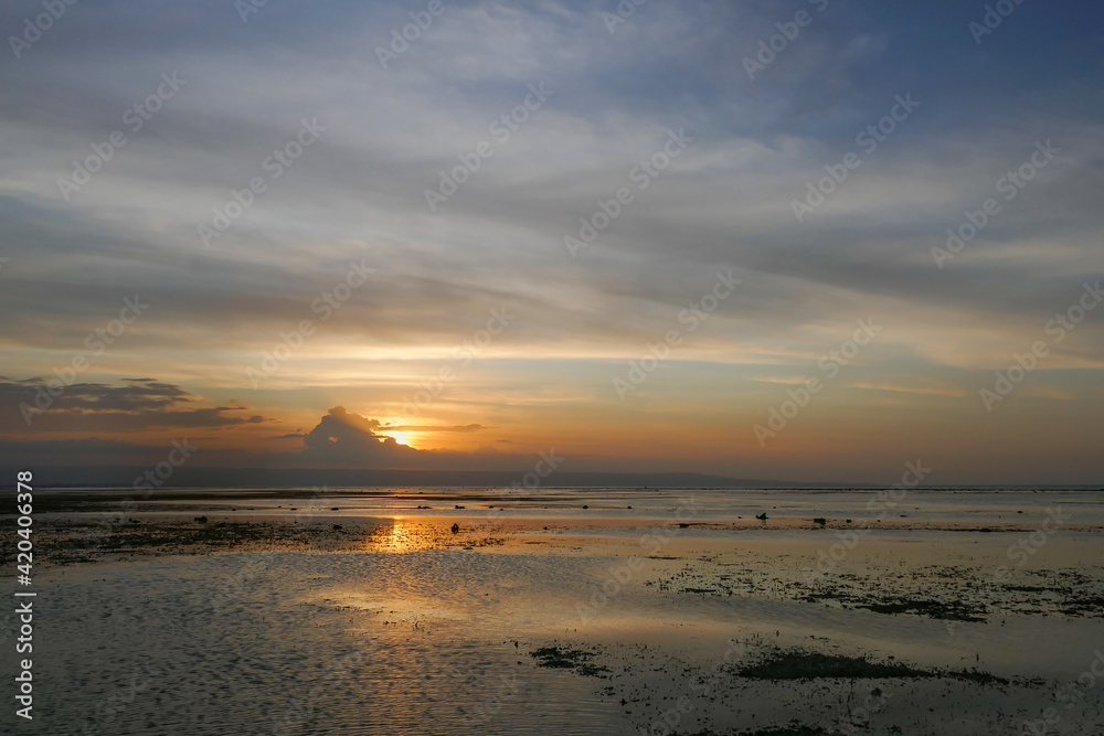 Beautiful sunset view on the Sawu sea at Walakiri beach near Waingapu on Sumba island, East Nusa Tenggara, Indonesia