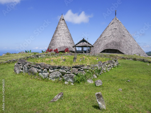 Landscape view of traditional Manggarai houses and sacred ritual area in Todo village, Manggarai regency, Flores island, East Nusa Tenggara, Indonesia photo