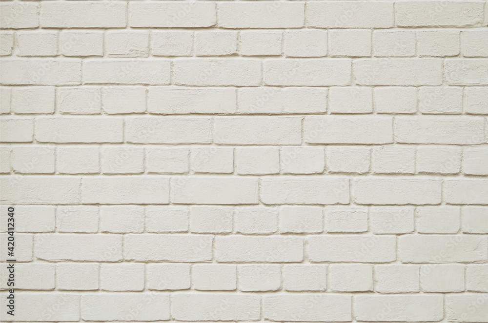 Old light beige brick wall texture for pattern background
