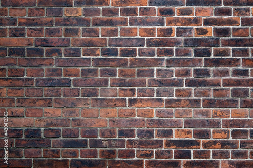 Old dark brick wall texture for pattern background