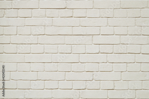 Old light beige brick wall texture for pattern background