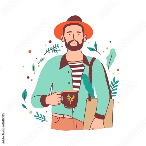 Young person, carrying organic groceries in shopping tote bag and holding reu...