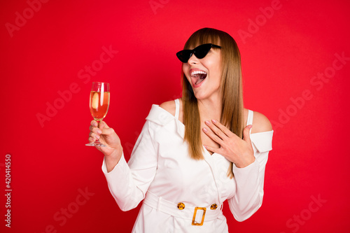 Photography Photo of young woman happy positive smile laugh drink champagne party toast isol