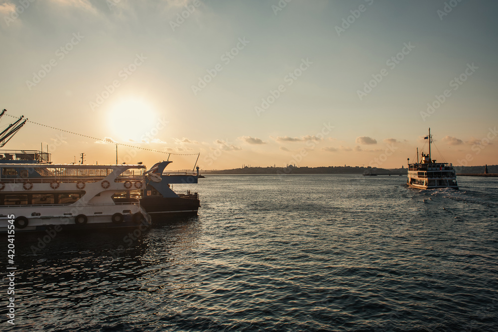 Ships in sea with sunset sky at background, Istanbul, Turkey