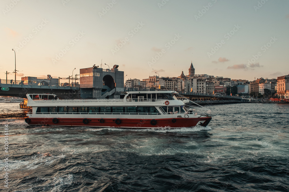 Ship and Istanbul city at background during sunset, Turkey