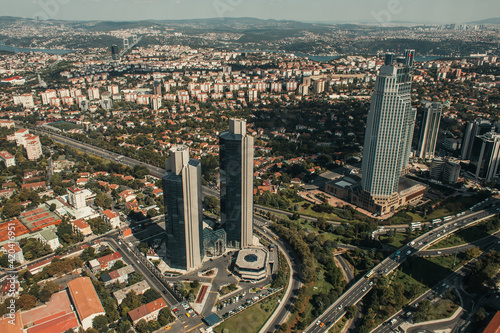 aerial view of streets with skyscrapers and modern buildings
