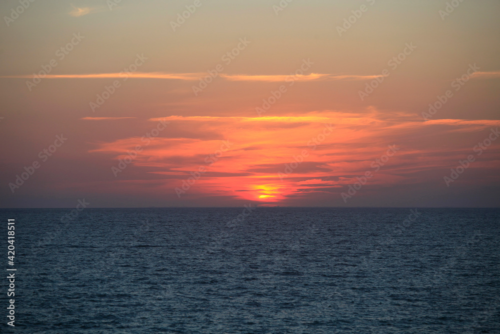 Beautiful evening landscape where the sea and the sky at sunset