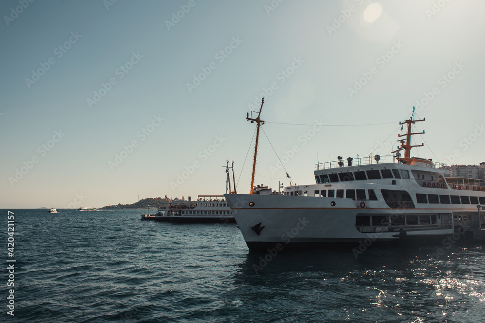 blue, cloudless sky over vessels floating on Bosphorus strait blue, cloudless sky over vessels floating on Bosphorus strait