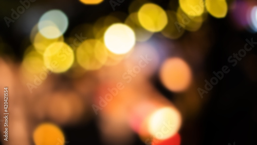 Abstract golden yellow bokeh background. Glow blurred lights, xmas decoration design template © besjunior