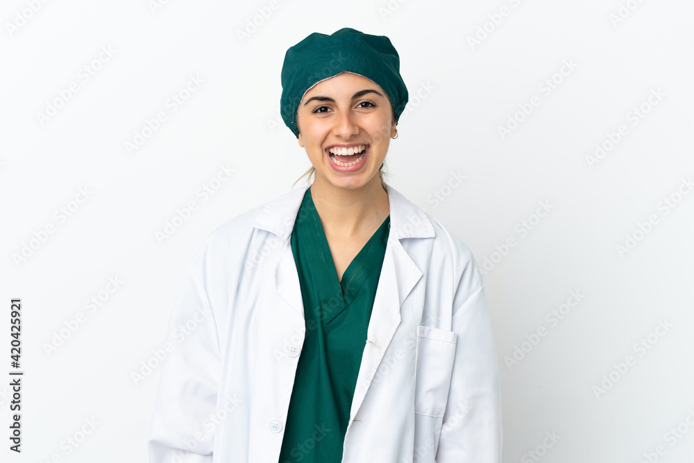 Surgeon caucasian woman isolated on white background with surprise facial expression Surgeon caucasian woman isolated on white background with surprise facial expression