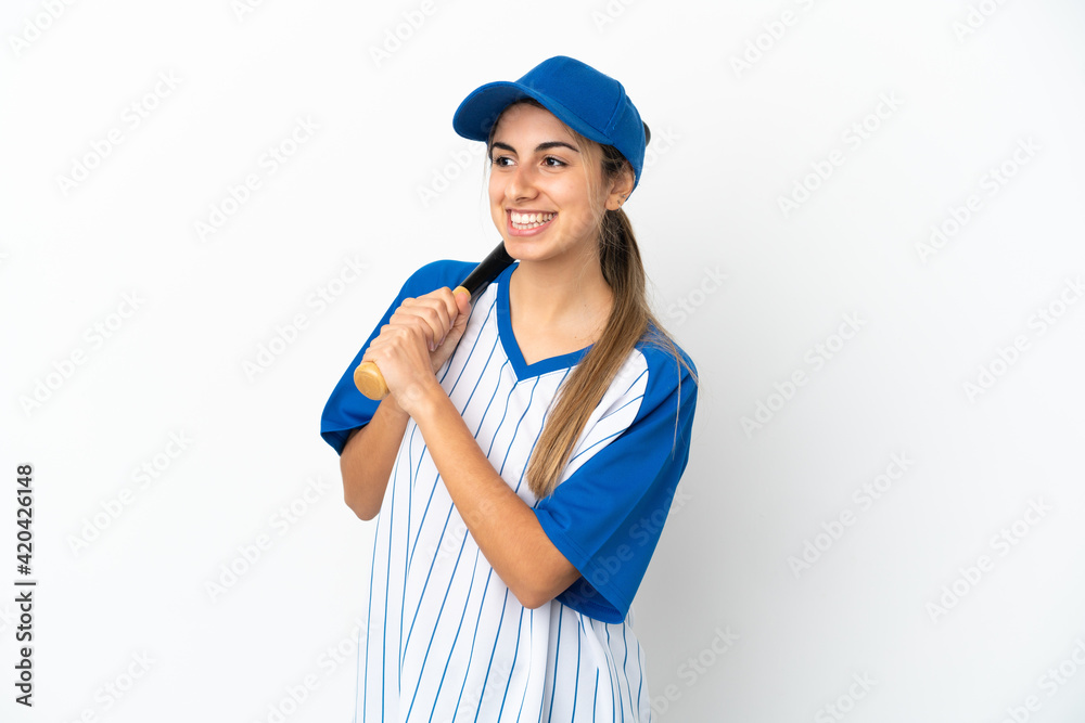 Young caucasian woman playing baseball isolated on white background looking side Young caucasian woman playing baseball isolated on white background looking side