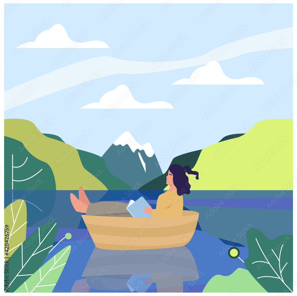 A girl sits in a boat on a lake in the middle of a mountain landscape. Mountains, lake, boat. Girl in a boat reading a book, outdoor recreation