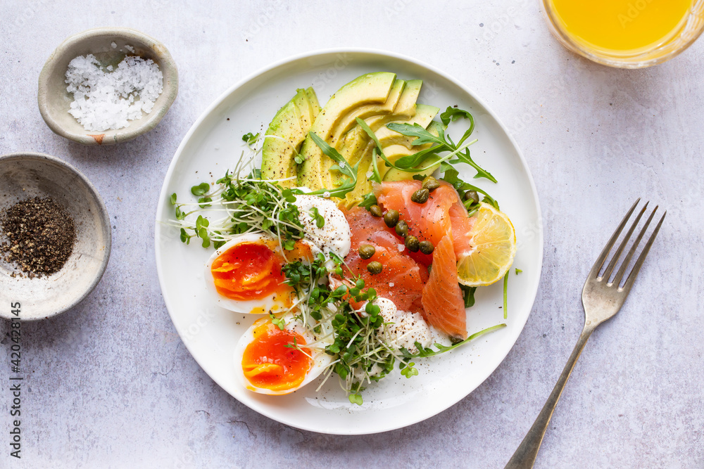 Healthy breakfast with egg, smoked salmon and avocado Healthy breakfast with egg, smoked salmon and avocado