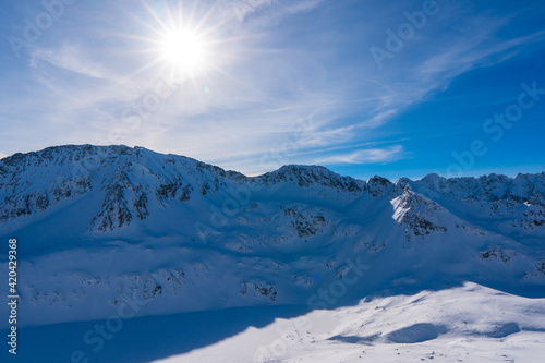 Fototapeta Naklejka Na Ścianę i Meble -  Winter snow covered mountain peaks in Tatras mountain. Great place for winter sports. Poland zakopane tatras