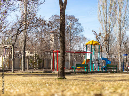  Children's park with colorful toys. there is nobody in the park. there are no people or children.