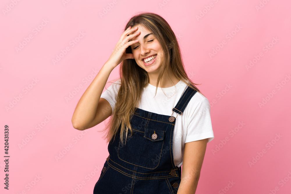 Young woman over isolated pink background laughing Young woman over isolated pink background laughing
