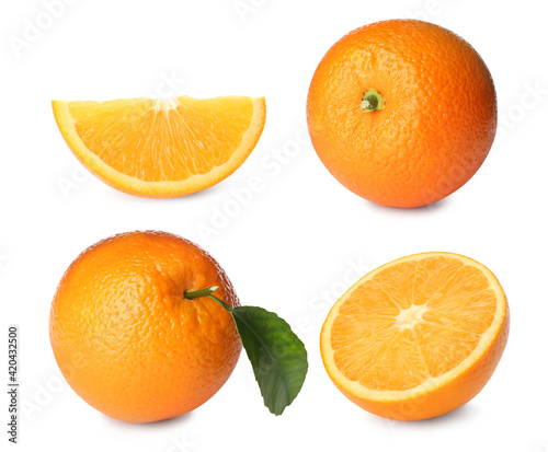 Set with tasty ripe oranges on white background