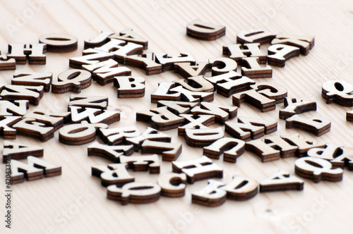 Jumbled wooden letters.