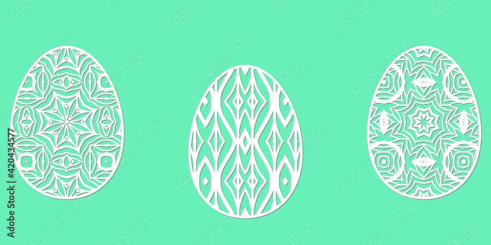 Eggs for Easter holidays - ornamental egg in paper art style. Set of decorative elements for cutting paper laser cutting and plotter. Eggs for Easter holidays - ornamental egg in paper art style. Set of decorative elements for cutting paper laser cutting and plotter.