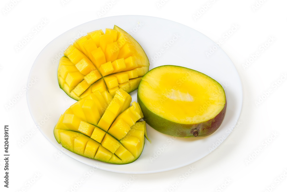 Mango cut into pieces and prepared in form hedgehog style Mango cut into pieces and prepared in form hedgehog style