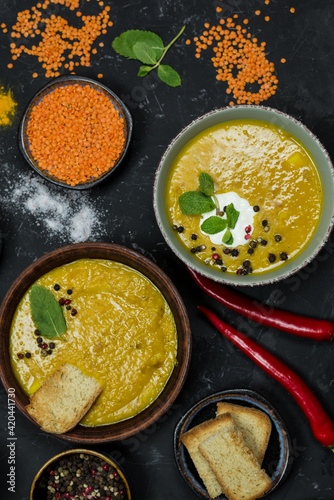 different types of lentil soup. coconut cream and herbs, spices and ingredients. vegetarian food 