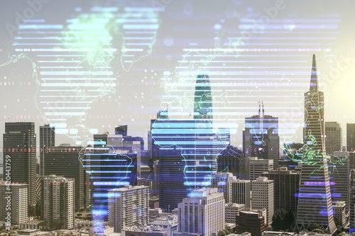 Double exposure of abstract digital world map hologram on San Francisco office buildings background, big data and blockchain concept