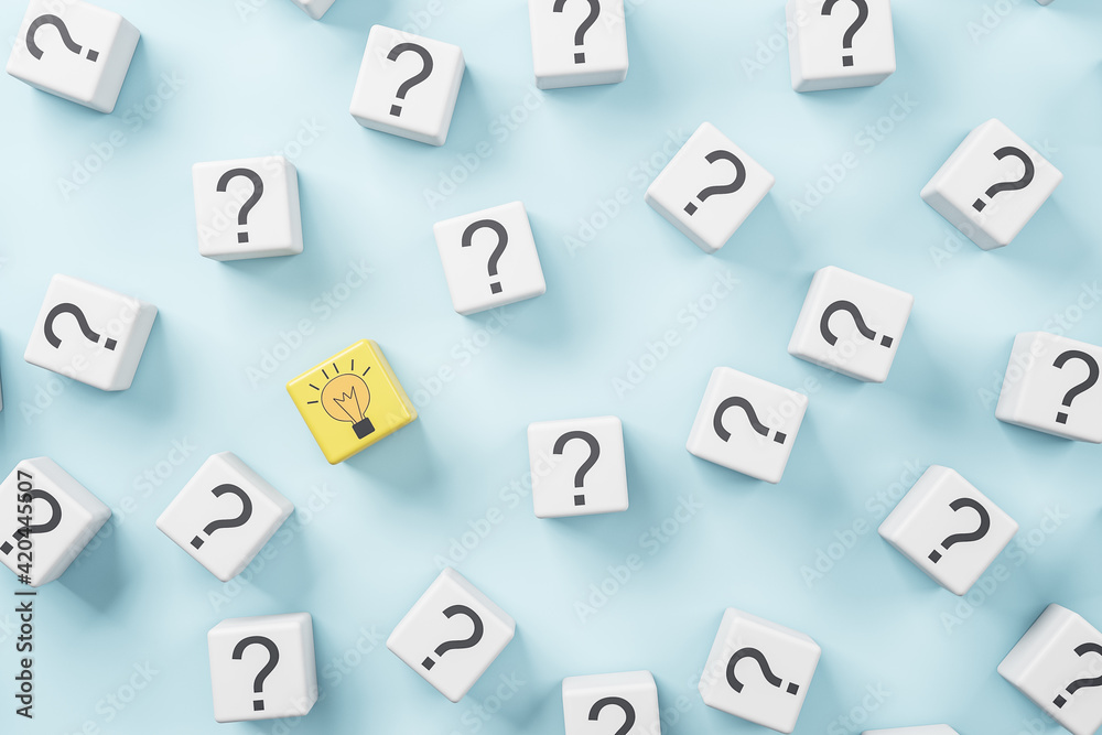Idea concept with white wooden cubes with question sign and one yellow with light bulb on blue background Idea concept with white wooden cubes with question sign and one yellow with light bulb on blue background