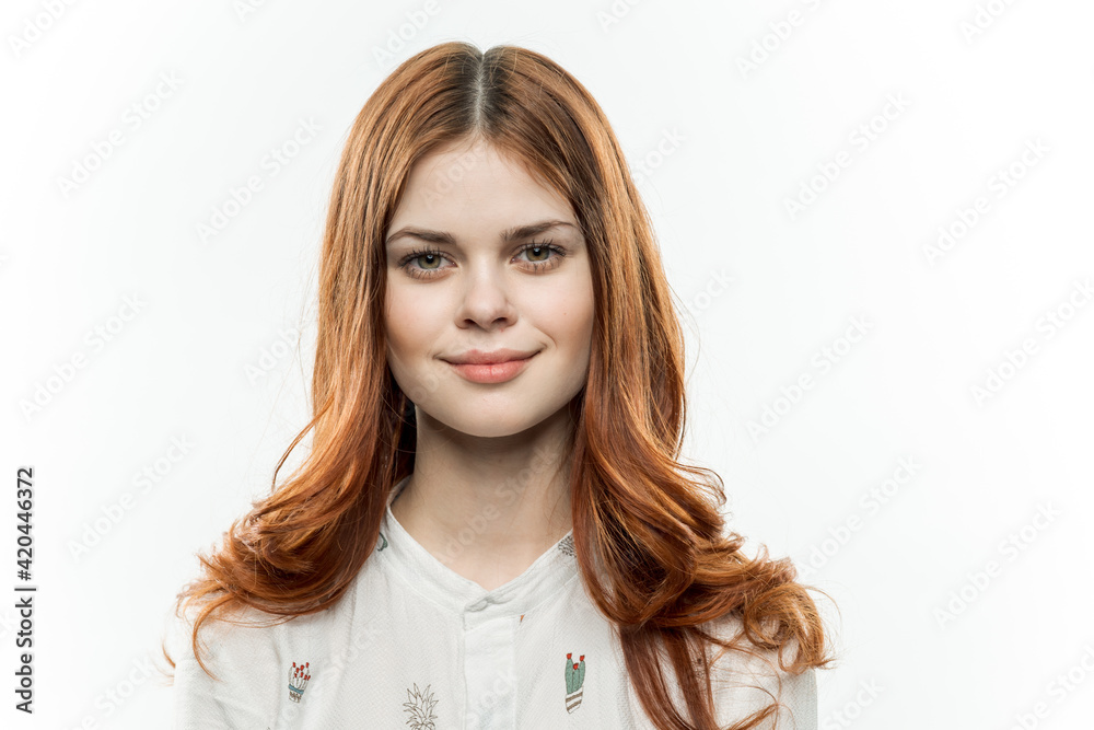 pretty red-haired woman smile cosmetics face closeup light background pretty red-haired woman smile cosmetics face closeup light background