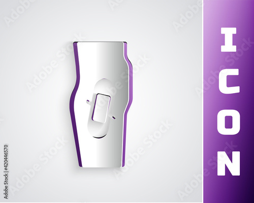 Paper cut Plaster on leg icon isolated on grey background. Paper art style. Vector