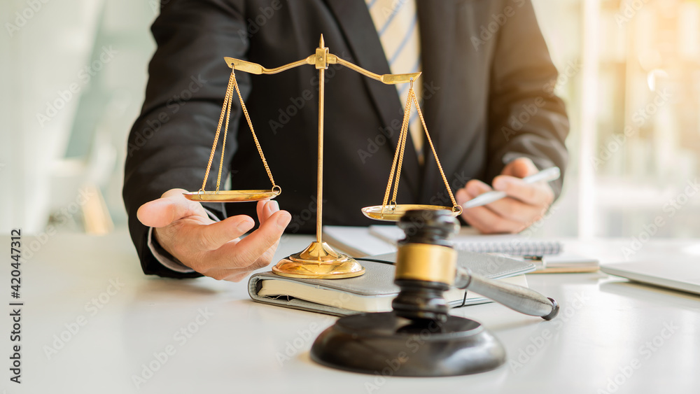 Male attorney advisor or judge advisor concept, having team meetings