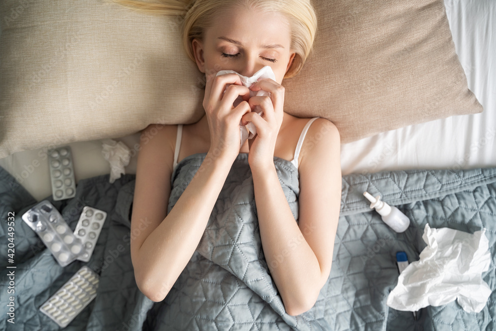 Sick day at home. Asian woman has runny and common cold. Sick day at home. Asian woman has runny and common cold.