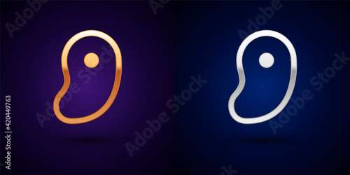 Gold and silver Steak meat icon isolated on black background. Vector