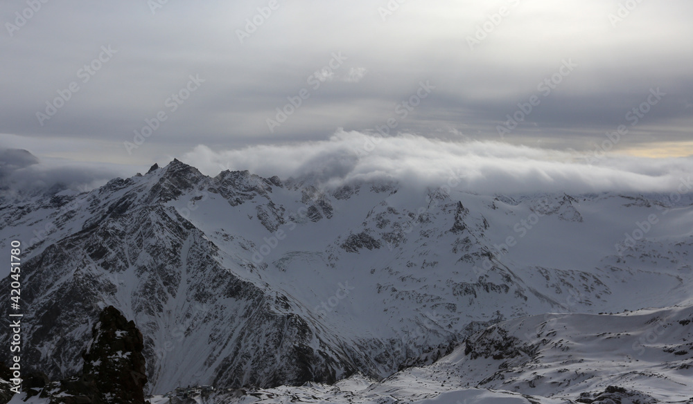 Highest mountain range of the Greater Caucasus beautiful cloudy landscape