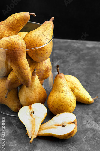 Organic Pears on Rustic Dark Background with Copy Space photo