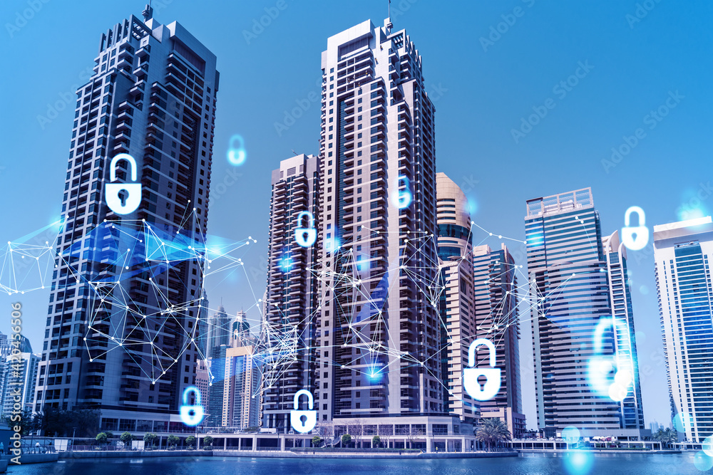 Skyscrapers of Dubai business downtown. International hub of trading and financial services. Lock icon hologram, concept of datum security. Double exposure. Dubai Canal waterfront.