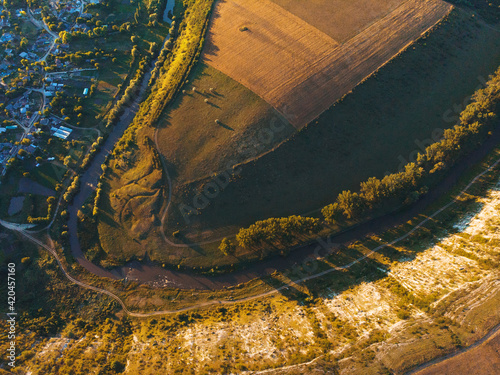 curve of river at sunset