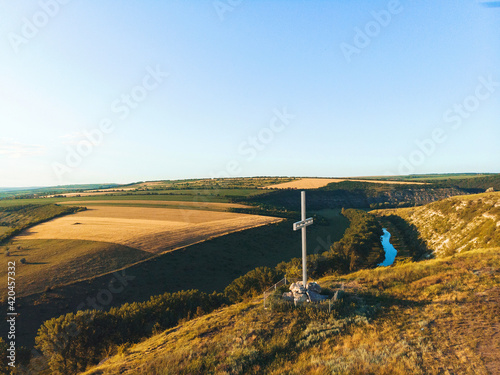 metal cross on top of hill