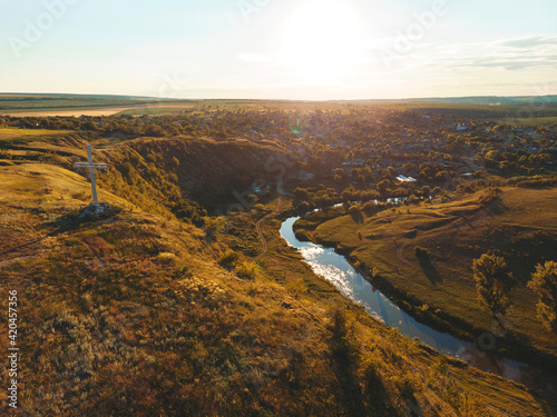 metal cross on top of hill